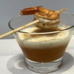 Cappuccino van tomaat en scampi